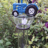 Regnmåler, blå traktor